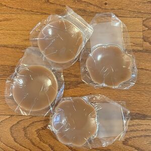 Package of four silicone adhesive bra (w/lift tape) and 10 nipple covers NWT